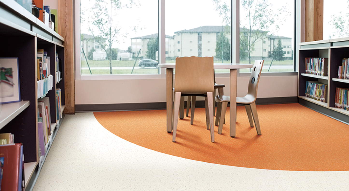 Interior of library with bookshelves and seating arrangement; Shutterstock ID 225428074