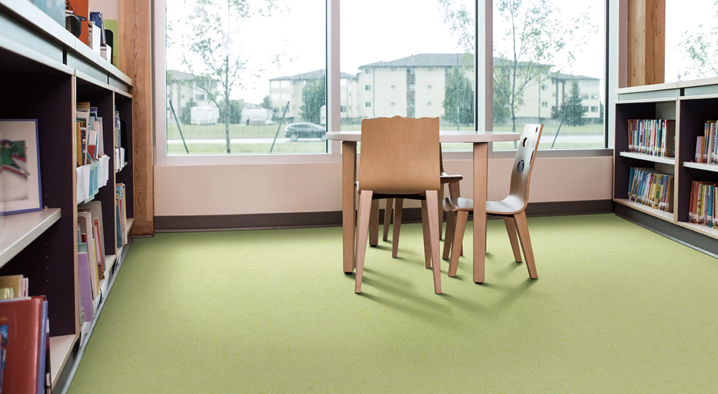 Interior of library with bookshelves and seating arrangement; Shutterstock ID 225428074