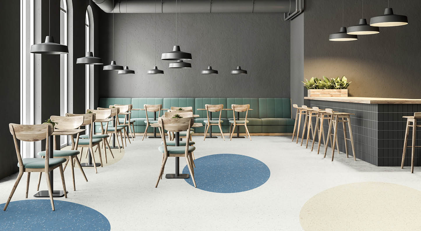 Industrial style cafe interior with dark gray walls, a concrete floor, arched windows and wooden tables with chairs  Green sofas  3d rendering mock up